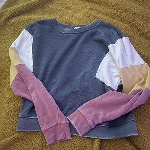 A light sweater. Size small.